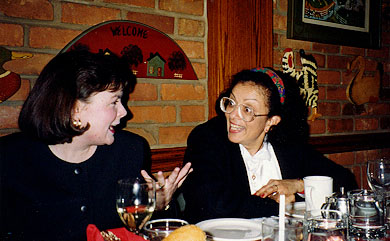 Fiona at a Christmas party in a restaurant with the architect of Gardner Voce Non-Profit Homes. December 1994.