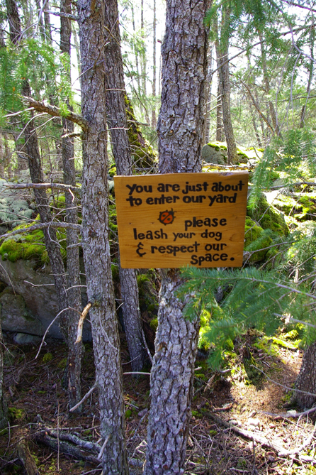 Camp Swampy gets new signs marking five-acre site boundary.