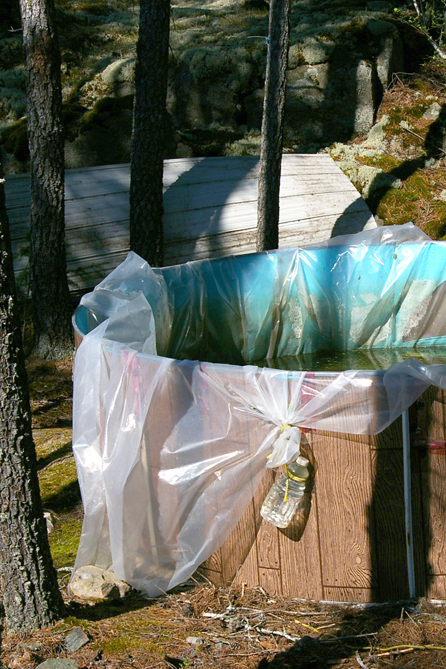 Camp Swampy water catchment on bluff needs repair.