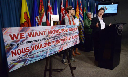 Kim Pate, executive director Canadian Association of Elizabeth Fry Societies, speaks as a coalition of women's equality groups holds a press conference on Parliament Hill last week to present the case they will make before the Supreme Court in support of the decriminalization of women in prostitution. (June 5, 2013) PHOTO: SEAN KILPATRICK/THE CANADIAN PRESS