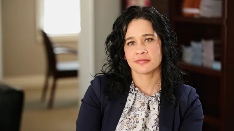 Casandra Diamond survived being sex trafficked for a decade within licensed Toronto massage parlours. New city staff recommendations to explore removing a cap on the number of body rub parlours is 'alarming,' she said at city hall on Tuesday. PHOTO: Paul Borkwood, CBC News