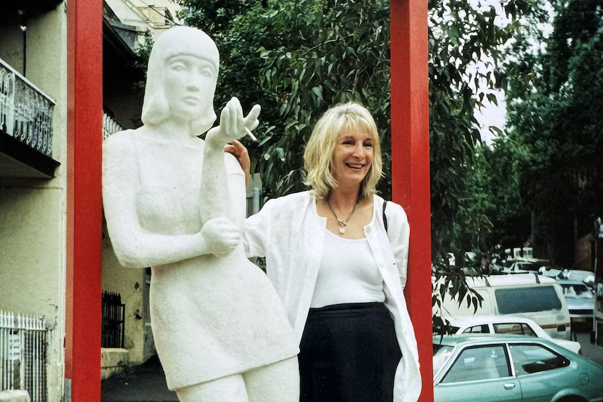 The artist and her original sculpture in the late '90s. Photo supplied: Loui May